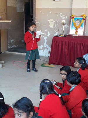 The student giving speech on Savtribai Phule.